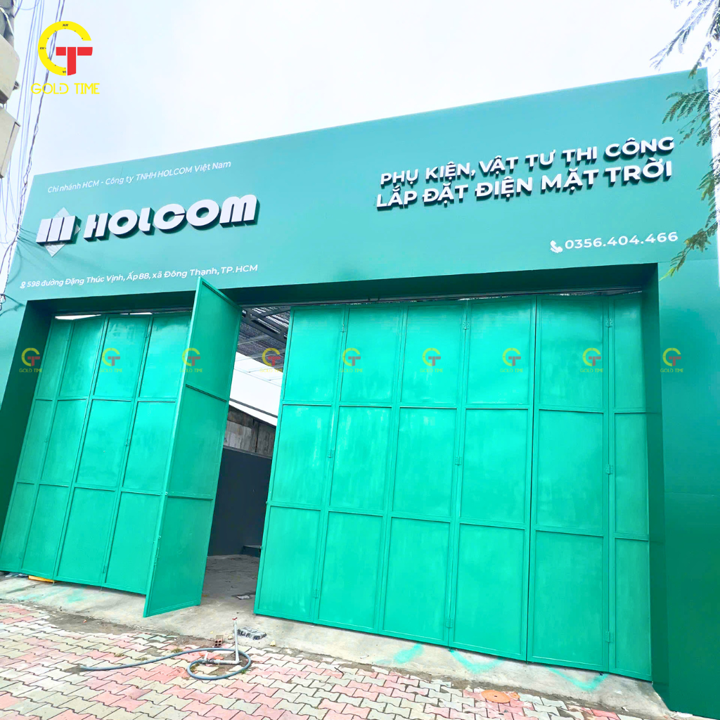 bảng hiệu alu chữ nổi HOLCOM góc nghiêng mặt tiền